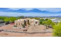 Southwestern style home with desert landscaping and mountain views at 29619 N 142Nd Pl, Scottsdale, AZ 85262