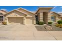 Charming single-Gathering home featuring a well-manicured lawn and a spacious three-car garage at 4584 W Detroit St, Chandler, AZ 85226