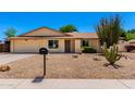 Charming single-story home with desert landscaping and a well-maintained front yard at 6533 E Kelton Ln, Scottsdale, AZ 85254
