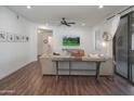 Spacious living room with hardwood floors, plenty of light, and contemporary furniture at 15252 N 100Th St # 1147, Scottsdale, AZ 85260