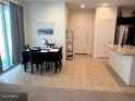 Dining area with stylish lighting and a view of the outdoor area at 1718 S 82Nd Way, Mesa, AZ 85209