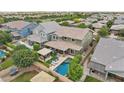 Aerial view of property featuring a backyard pool, covered patio, and beautiful landscaping at 2942 E Appaloosa Rd, Gilbert, AZ 85296