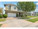 Charming home with a well-manicured lawn, two-car garage, and attractive landscaping at 2942 E Appaloosa Rd, Gilbert, AZ 85296