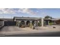 Attractive home with brickwork, desert landscaping, and attached garage at 4009 S Siesta Ln, Tempe, AZ 85282