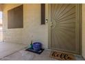 Covered entryway featuring a decorative security screen door at 4834 E Robin Ln, Phoenix, AZ 85054