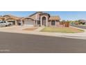 Beautiful single-Gathering home with a two-car garage, low maintenance desert landscaping, and a classic design at 6936 W Monterey Way, Phoenix, AZ 85033