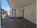 Covered carport with a storage door and mailbox for convenience at 7821 W Clarendon Ave, Phoenix, AZ 85033