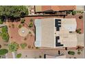 Birds-eye view of a landscaped property featuring desert landscaping, a pergola, and solar panels at 15774 W Indianola Dr # Six, Goodyear, AZ 85395