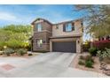 Charming two-story home showcasing a well-kept yard and an attached two-car garage at 21602 N 36Th St, Phoenix, AZ 85050