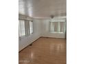 Bright living room featuring hardwood floors at 2650 W Union Hills Dr # 331, Phoenix, AZ 85027