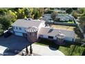Aerial shot of a home highlighting its unique architecture, landscaping, and circular accents at 333 W Bethany Home Rd, Phoenix, AZ 85013