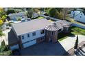 Aerial of property showcasing the house's architecture, circular features, and driveway at 333 W Bethany Home Rd, Phoenix, AZ 85013