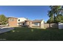 Well-manicured lawn and distinctive architecture define this home's appeal at 333 W Bethany Home Rd, Phoenix, AZ 85013