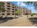 Exterior view of building with well-maintained landscaping and gravel ground cover at 7840 E Camelback Rd # 110, Scottsdale, AZ 85251