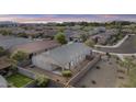 Aerial shot of a property showcasing a backyard with block fencing in a community setting at 9303 W Oregon Ave, Glendale, AZ 85305