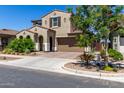 Charming two-story home with a desert landscape, two-car garage and tasteful architectural details at 9548 E Rainbow Ave, Mesa, AZ 85212