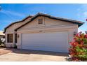 Charming single-story home featuring a two-car garage and well-maintained landscaping at 1279 N Blackstone Dr, Chandler, AZ 85224