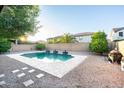 A private backyard pool offering a serene escape with ample space for outdoor enjoyment at 15028 W Columbine Dr, Surprise, AZ 85379