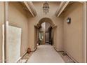 Inviting walkway to front door featuring an arched entrance, providing a warm welcome at 15550 S 5Th Ave # 130, Phoenix, AZ 85045