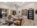 Comfortable living room boasting stylish furnishings and ample natural light from the expansive windows at 15550 S 5Th Ave # 130, Phoenix, AZ 85045