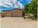 Charming single-Gathering home featuring a three-car garage and well-maintained landscaping at 22322 N 77Th St, Scottsdale, AZ 85255