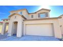 Charming two-story home with a neutral color scheme and a two car garage at 7425 W Crown King Rd, Phoenix, AZ 85043
