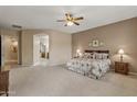 Expansive main bedroom with neutral tones, plush carpeting, and ample space at 2612 S Jacob St, Gilbert, AZ 85295