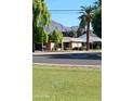 Charming single story brick home with a well-manicured lawn and mountain views at 3942 N 38Th St, Phoenix, AZ 85018