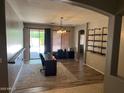 Bright office space featuring wood floors, ample natural light, and modern shelving at 4130 E Megan St, Gilbert, AZ 85295