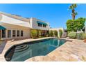 Backyard pool and patio area, perfect for outdoor entertainment and relaxation at 8637 E Via De La Escuela --, Scottsdale, AZ 85258