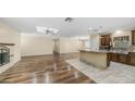 View of the open concept kitchen and living room with hard wood floors at 1001 W Northern Ave, Phoenix, AZ 85021
