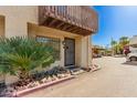 Inviting condo entrance with a secure gate and low-maintenance landscaping at 1618 N 32Nd St # 5, Phoenix, AZ 85008