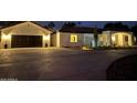 Stunning desert home with a circular drive and a detached garage offers ample parking at 5430 E Shea Blvd, Scottsdale, AZ 85254