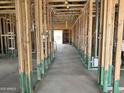 Interior view shows a home under construction with exposed framing and a concrete floor at 5507 W Piedmont Rd, Laveen, AZ 85339