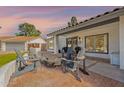 Inviting patio area with comfortable seating around a fire pit, perfect for outdoor entertaining at 1747 W Echo Ln, Phoenix, AZ 85021