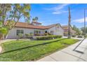 Charming single-Gathering home with well-maintained landscaping and inviting curb appeal at 2333 E Egret Ct, Gilbert, AZ 85234