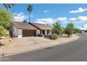 Charming home featuring a two-car garage and well-kept landscaping at 2633 S El Dorado Dr, Mesa, AZ 85202