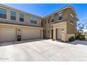 Beautiful home with a large driveway and stone accents around the front door, offering great curb appeal at 5100 E Rancho Paloma Dr # 2065, Cave Creek, AZ 85331