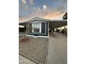 Charming single-story home with a spacious carport and low-maintenance desert landscaping at 8103 E Southern Ave # 279, Mesa, AZ 85209