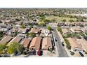 An aerial view of a residential neighborhood showcasing the home's location in a Primary-planned community at 2768 W Jasper Butte Dr, San Tan Valley, AZ 85144