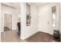 Bright and welcoming foyer featuring tiled floors and neutral wall colors at 3810 S Star Canyon Dr, Gilbert, AZ 85297