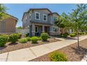 Beautiful two-story home with landscaped front yard and inviting curb appeal at 3850 E Robert St, Gilbert, AZ 85295