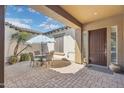 Cozy patio with outdoor dining set, ideal for enjoying meals and relaxing in the open air at 5330 S Big Horn Pl, Chandler, AZ 85249