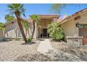 Inviting front entrance with a decorative door, desert landscaping, and the house number clearly displayed at 7508 E Aster Dr, Scottsdale, AZ 85260