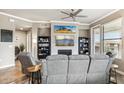 Spacious living room featuring neutral colors, fireplace, and contemporary decor at 7601 E Indian Bend Rd # 3002, Scottsdale, AZ 85250