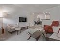 Inviting living room with neutral colors and cozy seating at 3830 E Lakewood E Pkwy # 1007, Phoenix, AZ 85048