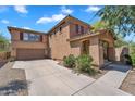 Two story home with red shutter and arched entry way at 6469 W Ruth Ave, Glendale, AZ 85302