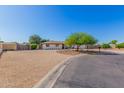 Ranch style home featuring low-maintenance desert landscaping and long driveway at 8767 W Villa Hermosa --, Peoria, AZ 85383