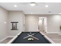 Entertainment area with billiard table with contemporary decor and bright lighting at 10240 N 34Th Pl, Phoenix, AZ 85028