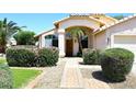 Welcoming facade of a home boasting lush landscaping and a charming entryway at 1212 W Vera Ln, Tempe, AZ 85284